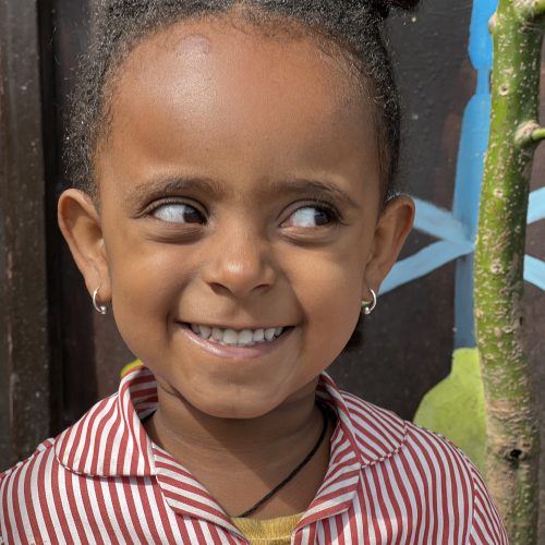 Pretty young girl from Ethiopia grinning